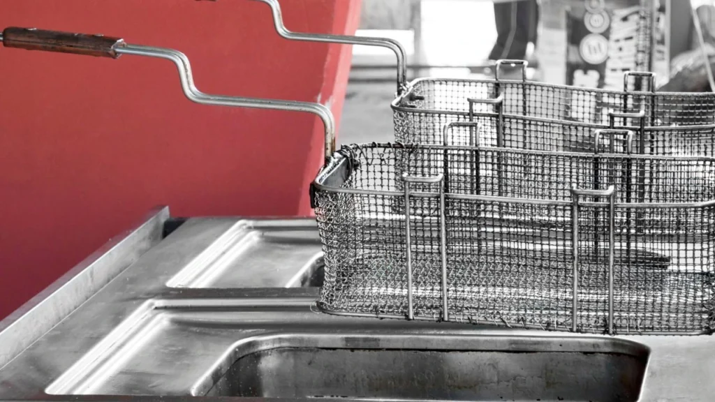 clean deep fryer baskets in the kitchen