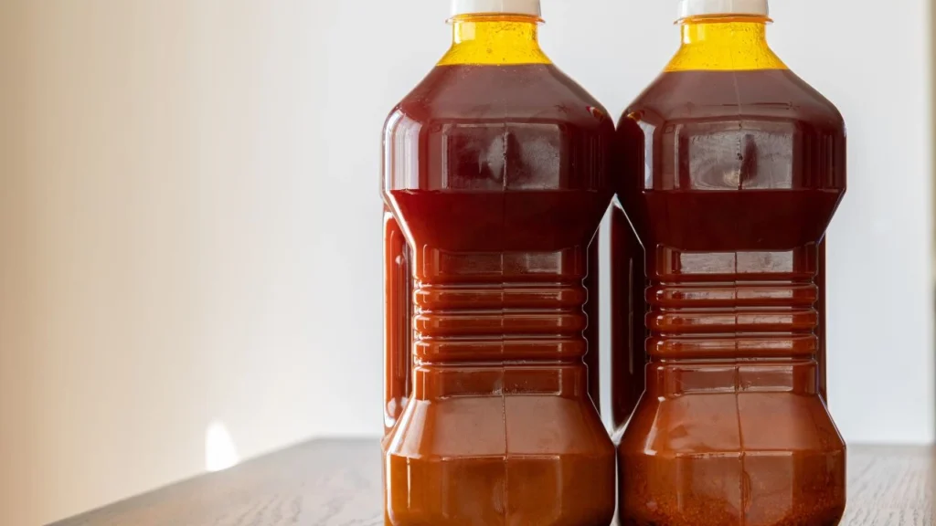 Two bottles of used cooking oil