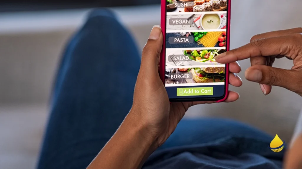 Person selecting online food orders on mobile ordering app