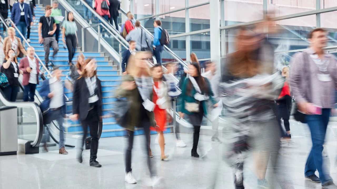 busy crowd at australasian hospitality and gaming expo event.