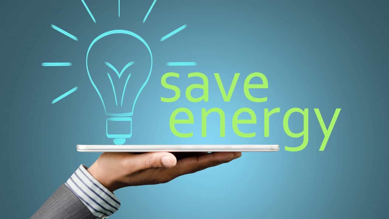 Hand showing text with the words energy savings