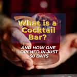 what is a cocktail bar: handing holding a drink